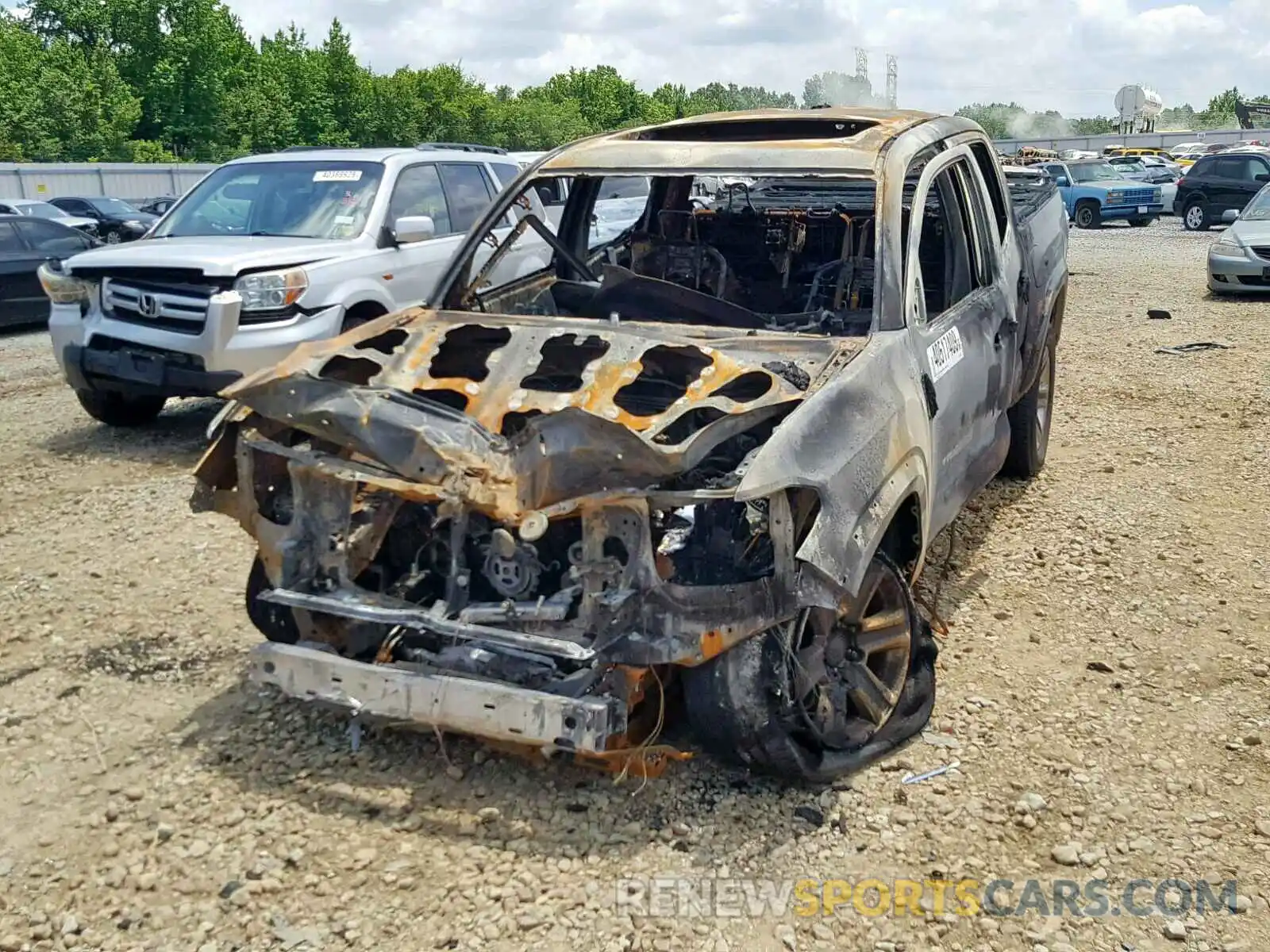 2 Photograph of a damaged car 3TMGZ5AN6KM235823 TOYOTA TACOMA 2019