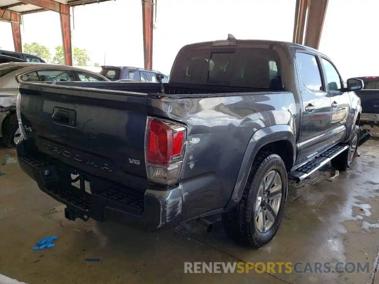 4 Photograph of a damaged car 3TMGZ5AN6KM249723 TOYOTA TACOMA 2019