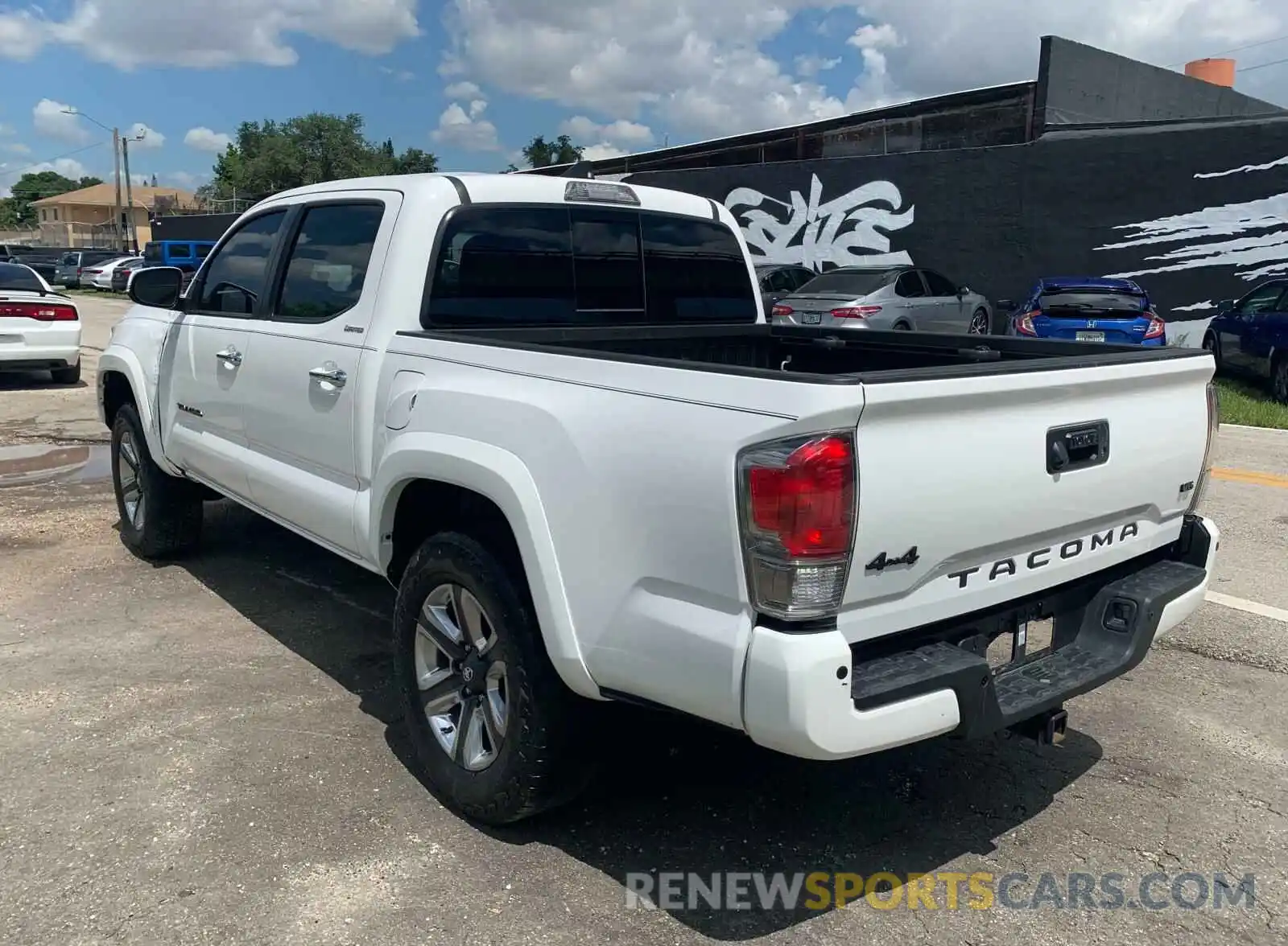 2 Photograph of a damaged car 3TMGZ5AN7KM263288 TOYOTA TACOMA 2019