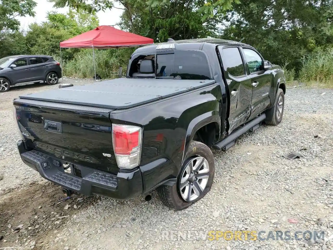 4 Photograph of a damaged car 3TMGZ5ANXKM228468 TOYOTA TACOMA 2019