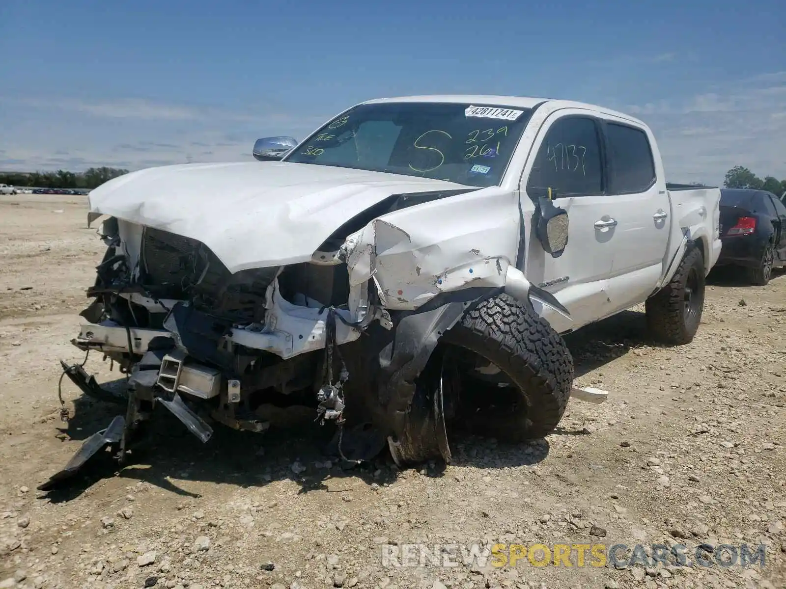 2 Photograph of a damaged car 3TMGZ5ANXKM239261 TOYOTA TACOMA 2019