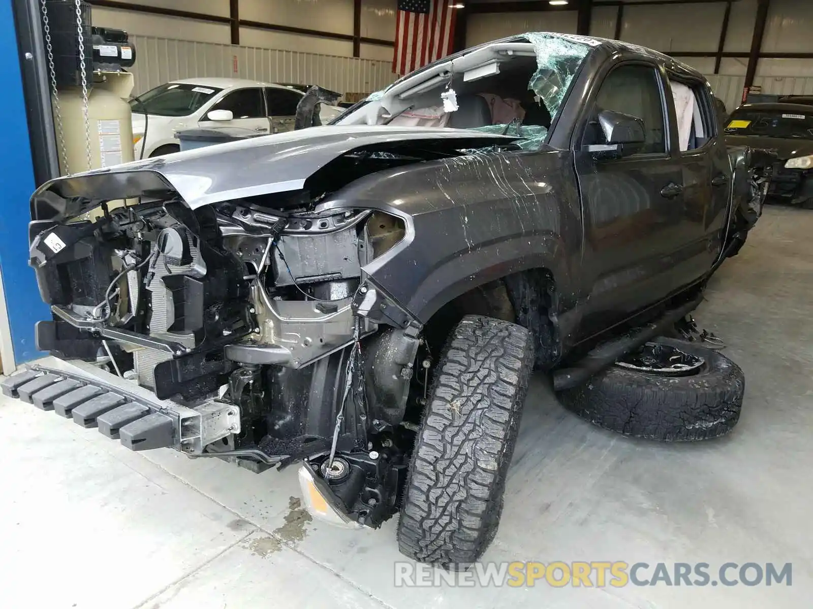 2 Photograph of a damaged car 5TFAX5GN0KX132443 TOYOTA TACOMA 2019