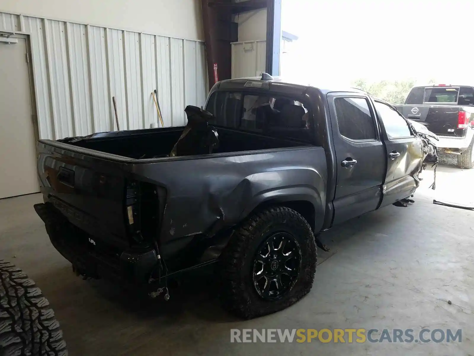 4 Photograph of a damaged car 5TFAX5GN0KX132443 TOYOTA TACOMA 2019