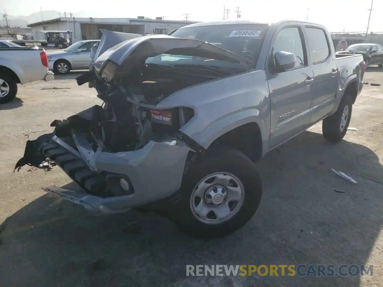 2 Photograph of a damaged car 5TFAX5GN0KX134418 TOYOTA TACOMA 2019