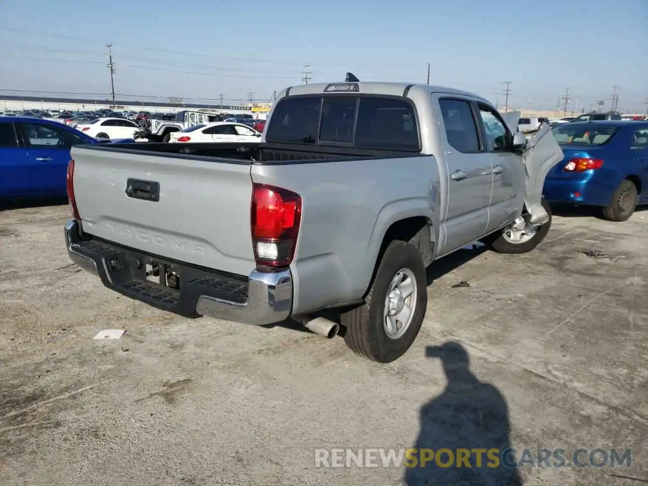 4 Photograph of a damaged car 5TFAX5GN0KX134418 TOYOTA TACOMA 2019