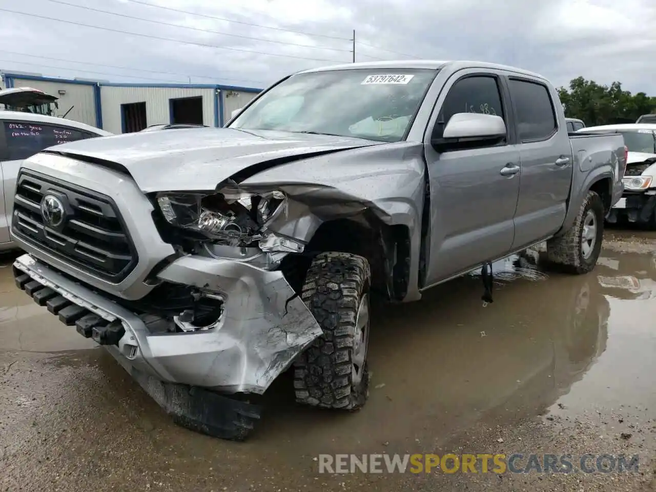 2 Photograph of a damaged car 5TFAX5GN0KX135259 TOYOTA TACOMA 2019