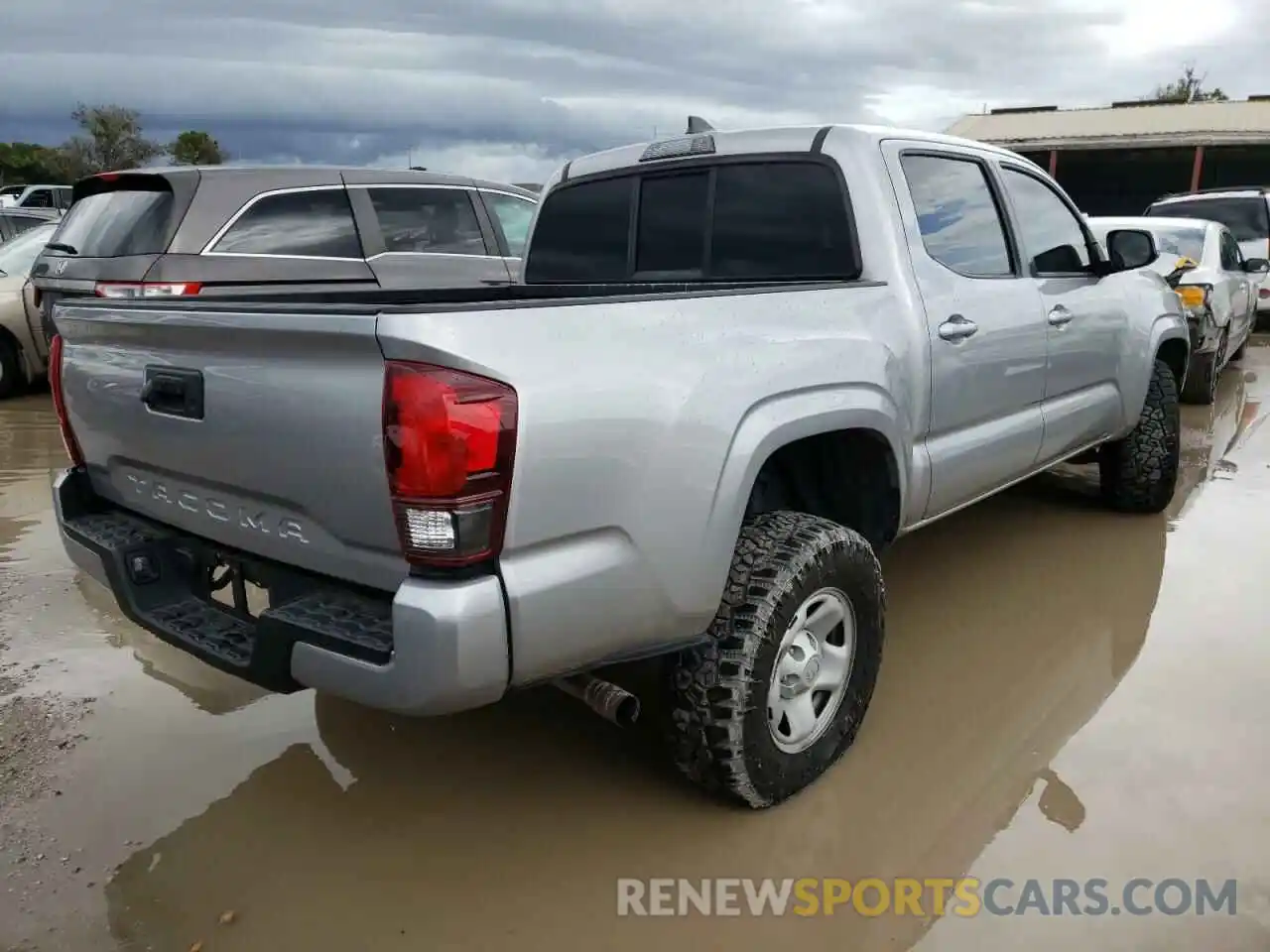 4 Photograph of a damaged car 5TFAX5GN0KX135259 TOYOTA TACOMA 2019