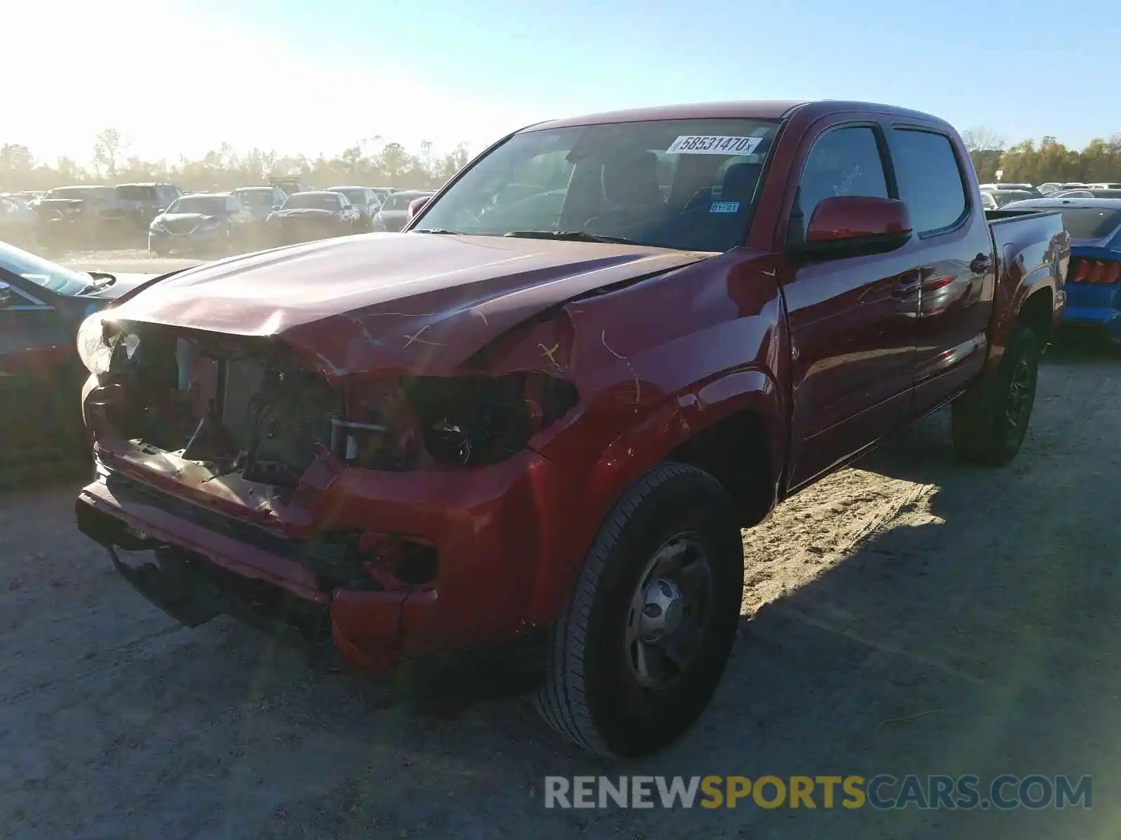 2 Photograph of a damaged car 5TFAX5GN0KX136248 TOYOTA TACOMA 2019