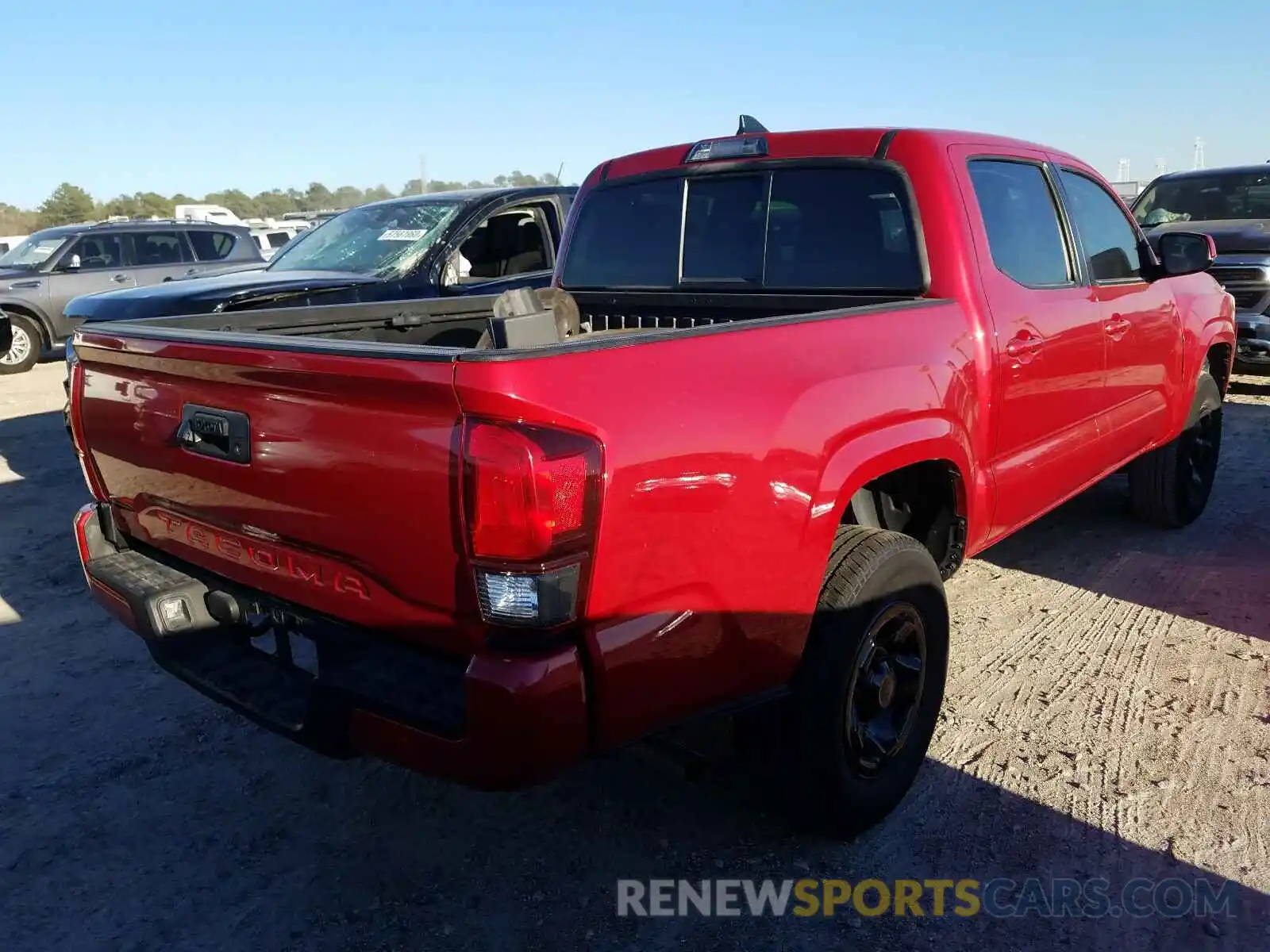 4 Photograph of a damaged car 5TFAX5GN0KX136248 TOYOTA TACOMA 2019