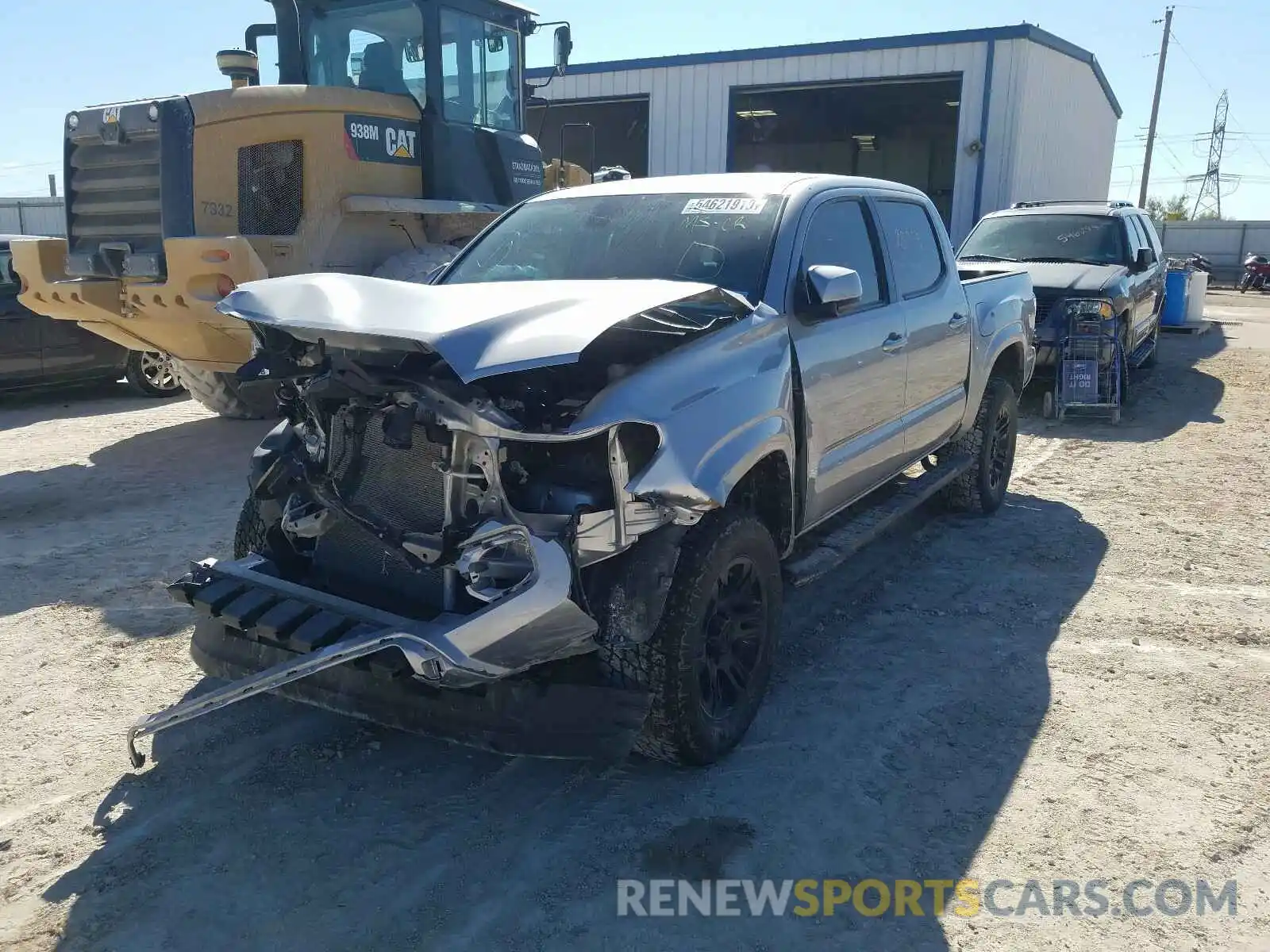 2 Photograph of a damaged car 5TFAX5GN0KX137917 TOYOTA TACOMA 2019