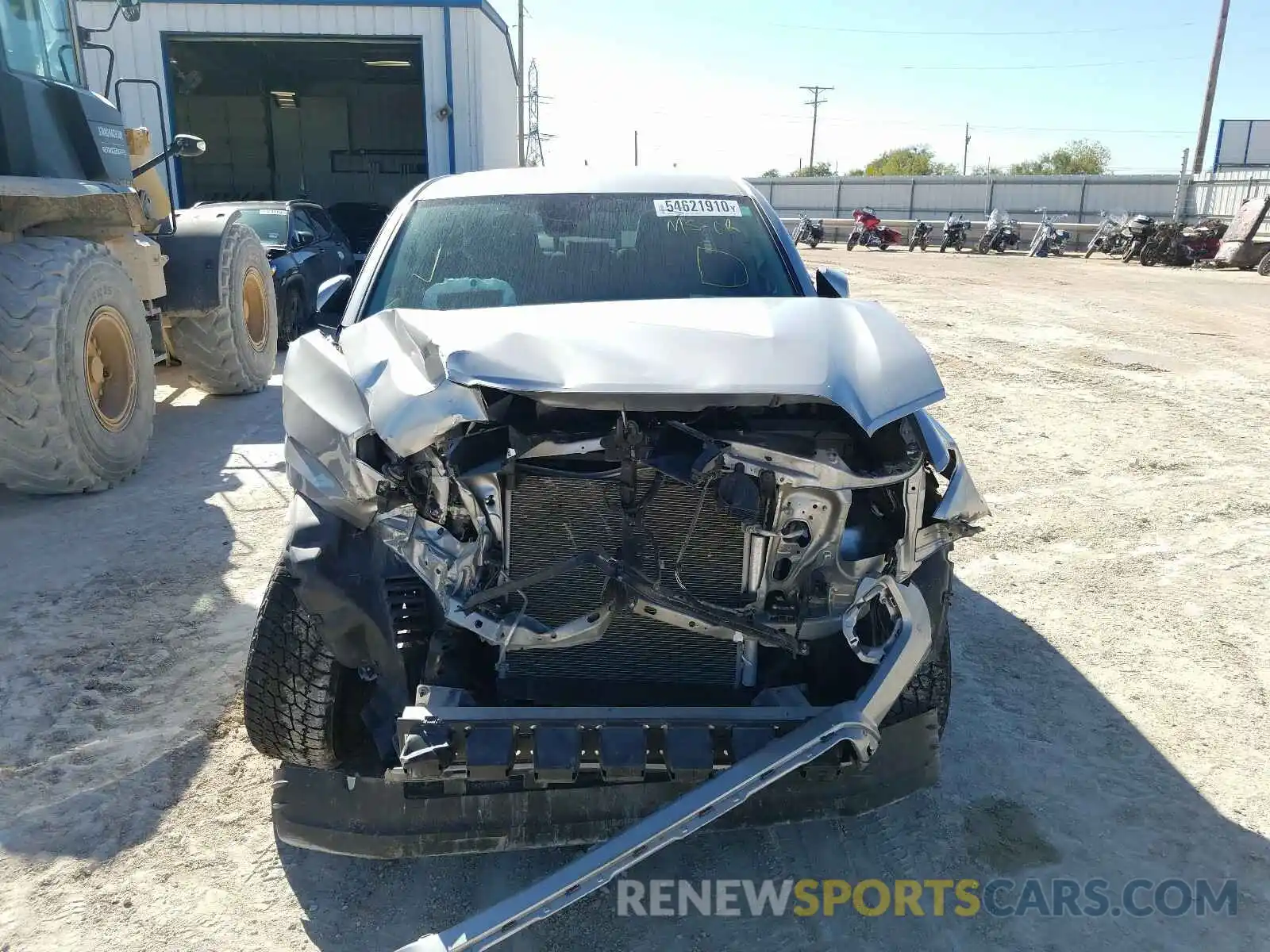 9 Photograph of a damaged car 5TFAX5GN0KX137917 TOYOTA TACOMA 2019