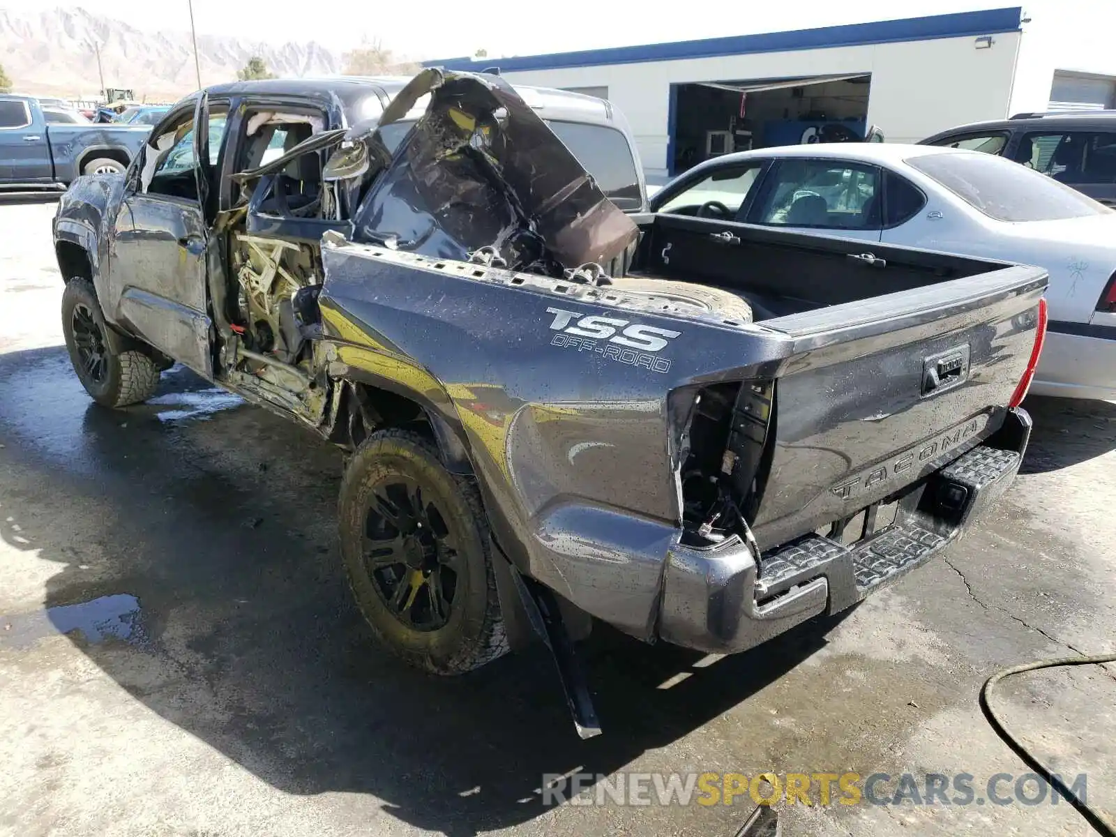 3 Photograph of a damaged car 5TFAX5GN0KX138341 TOYOTA TACOMA 2019