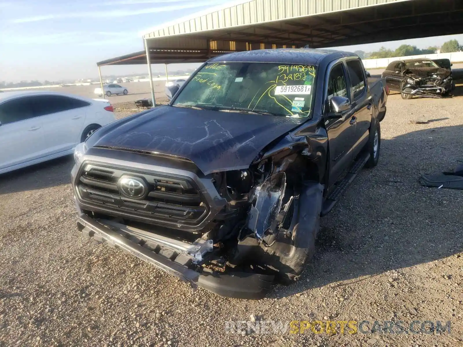 2 Photograph of a damaged car 5TFAX5GN0KX139182 TOYOTA TACOMA 2019