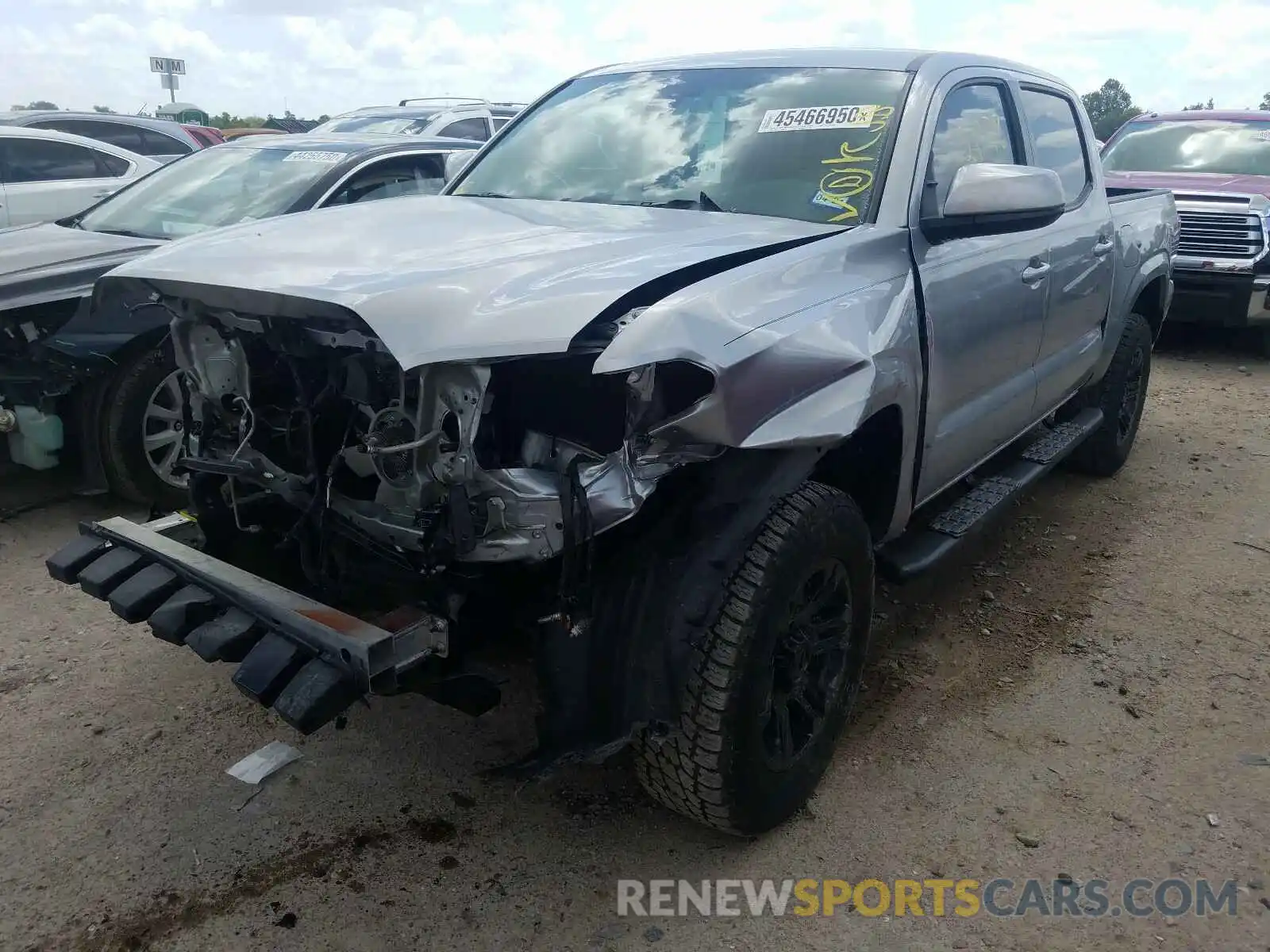 2 Photograph of a damaged car 5TFAX5GN0KX140302 TOYOTA TACOMA 2019