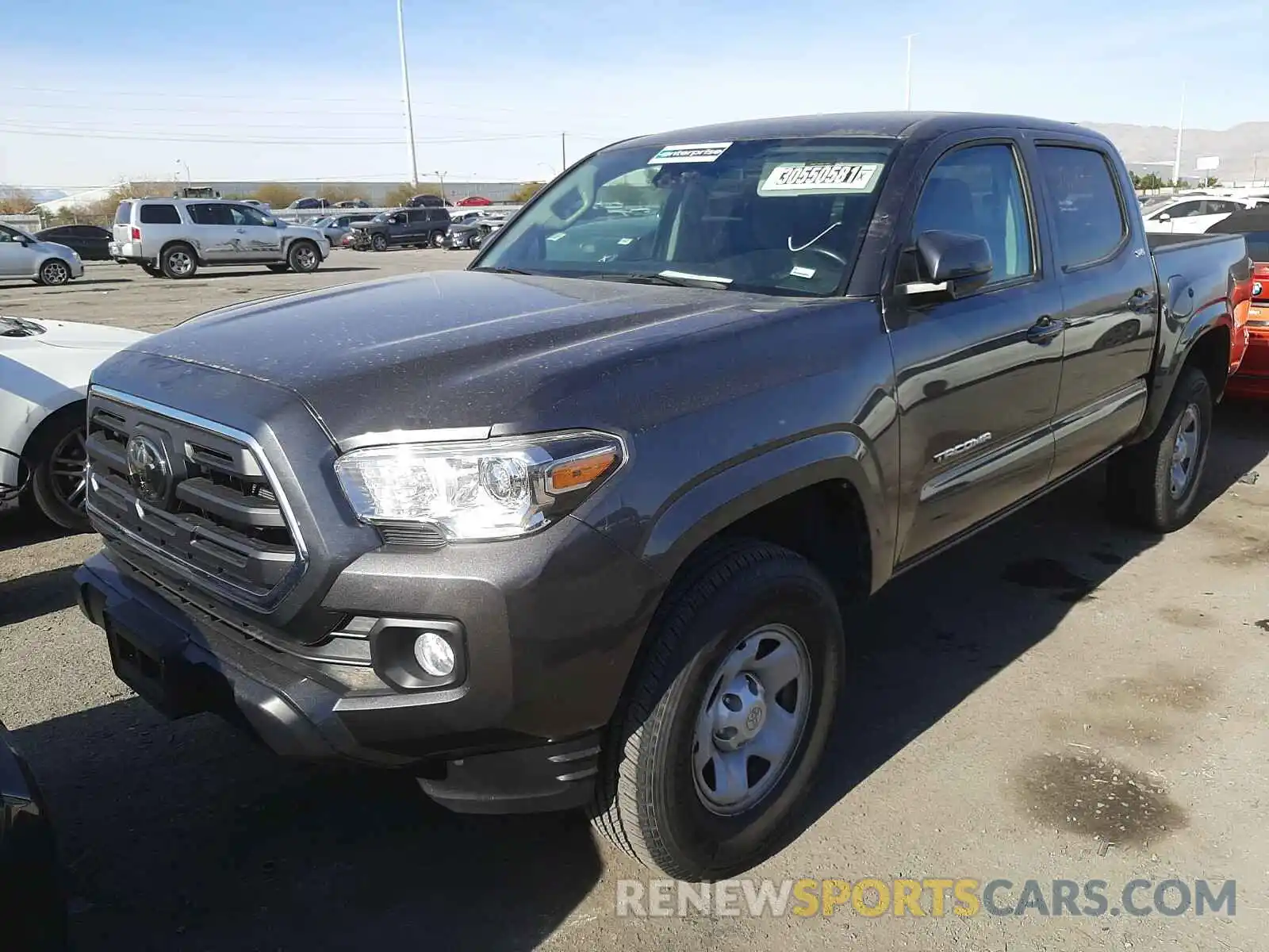 2 Photograph of a damaged car 5TFAX5GN0KX143197 TOYOTA TACOMA 2019