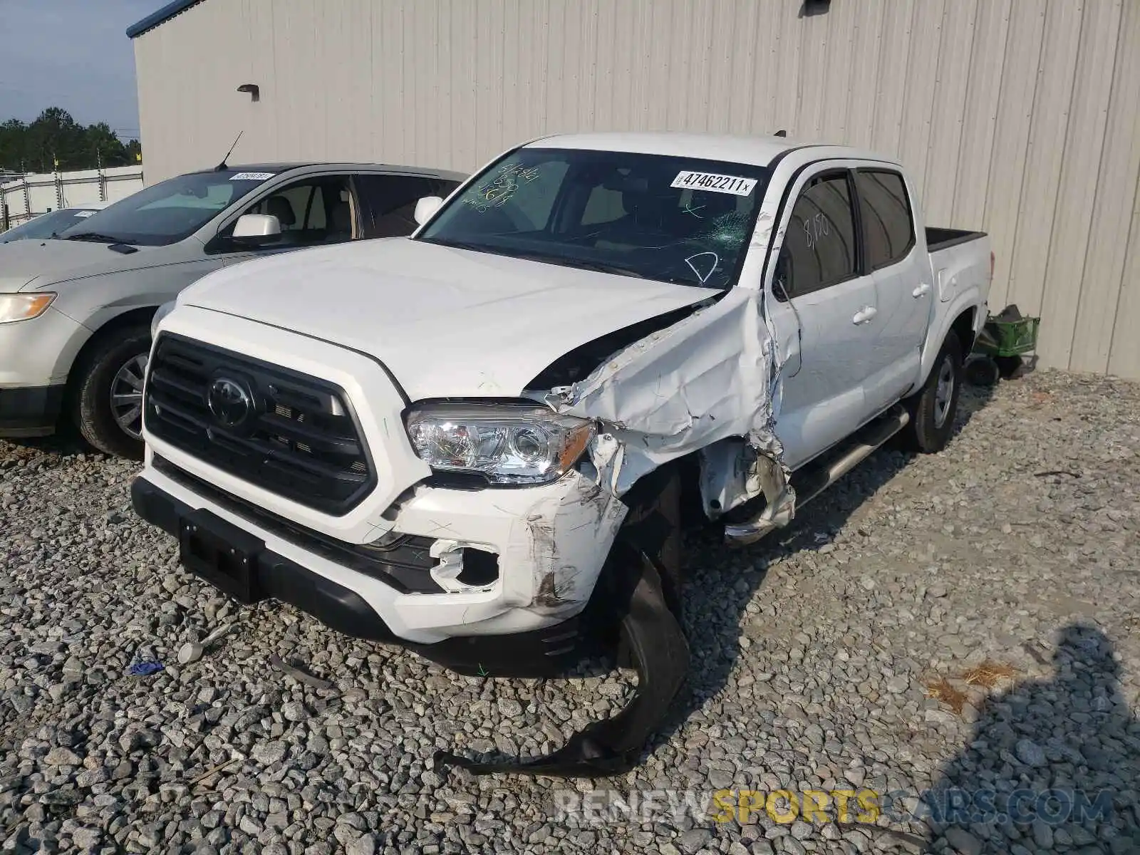 2 Photograph of a damaged car 5TFAX5GN0KX143474 TOYOTA TACOMA 2019