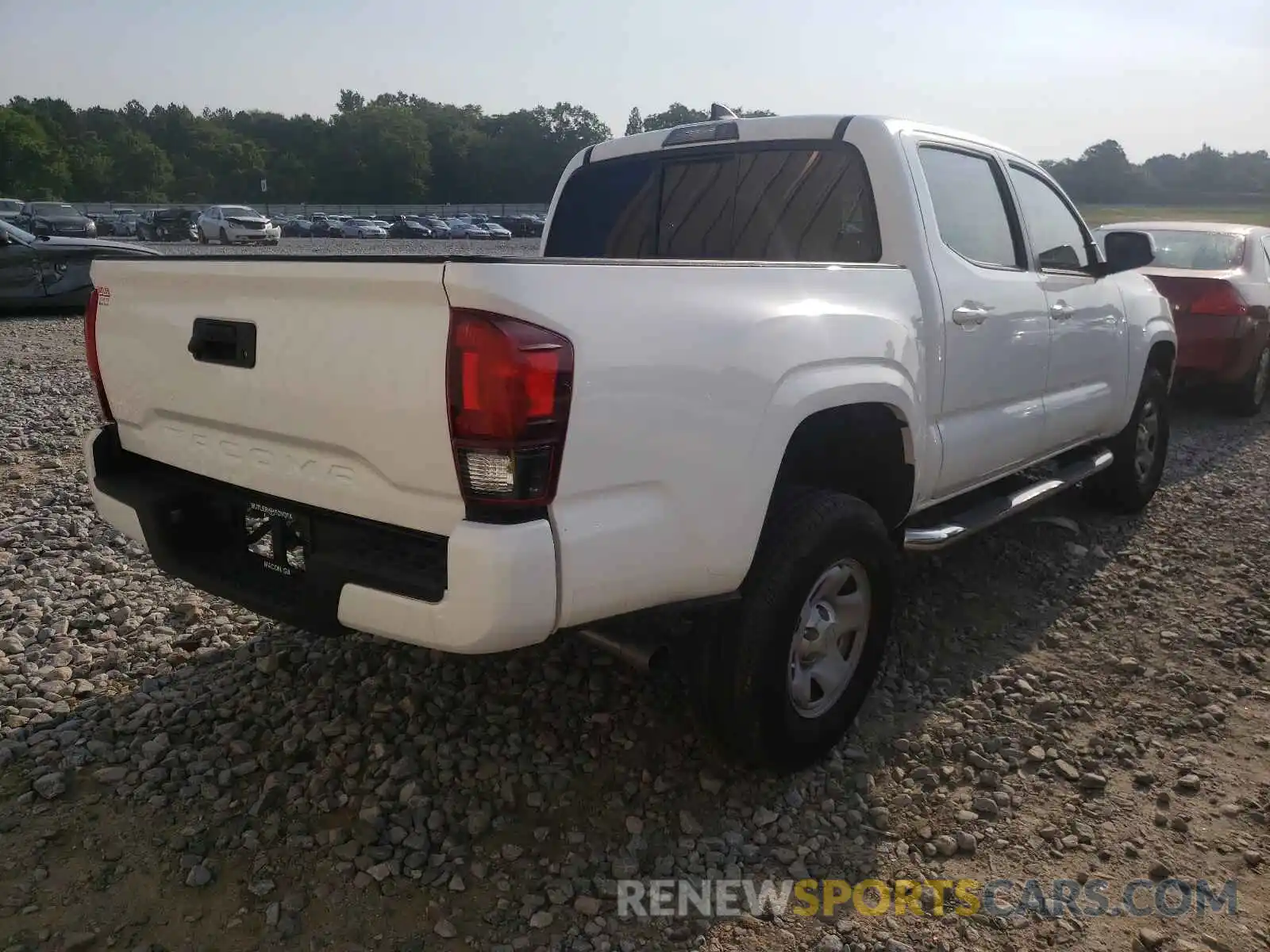 4 Photograph of a damaged car 5TFAX5GN0KX143474 TOYOTA TACOMA 2019