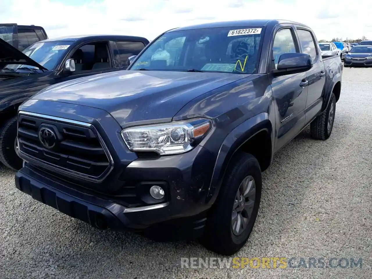 2 Photograph of a damaged car 5TFAX5GN0KX144205 TOYOTA TACOMA 2019