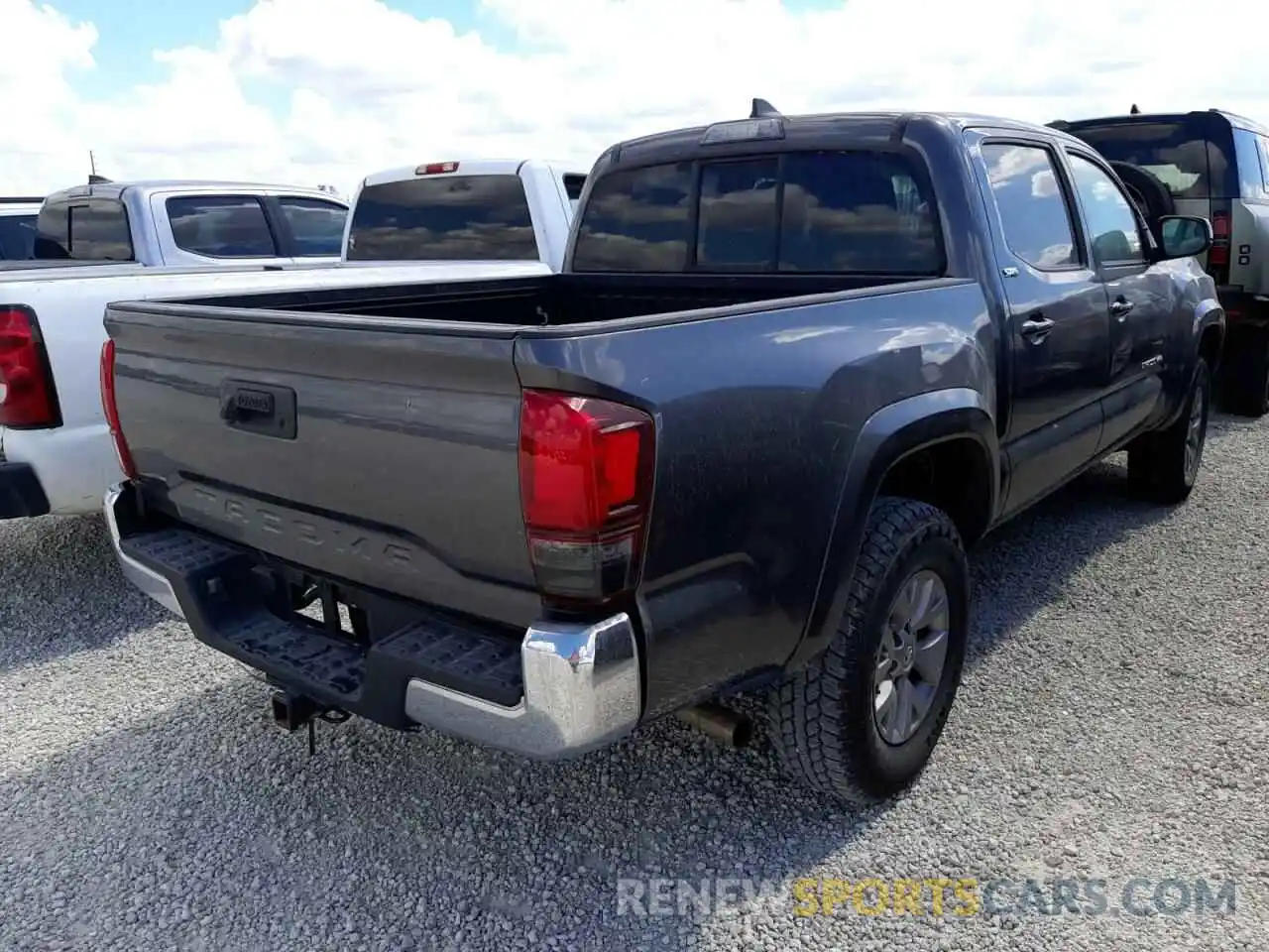 4 Photograph of a damaged car 5TFAX5GN0KX144205 TOYOTA TACOMA 2019