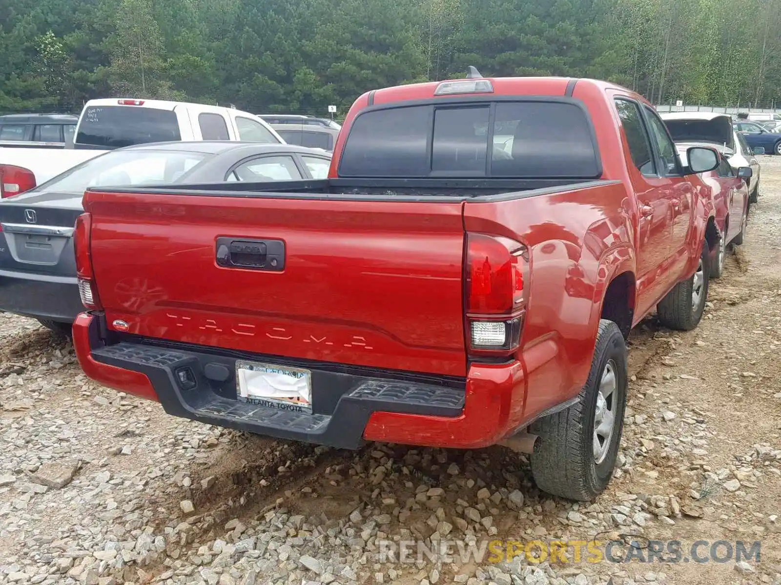 4 Photograph of a damaged car 5TFAX5GN0KX144964 TOYOTA TACOMA 2019