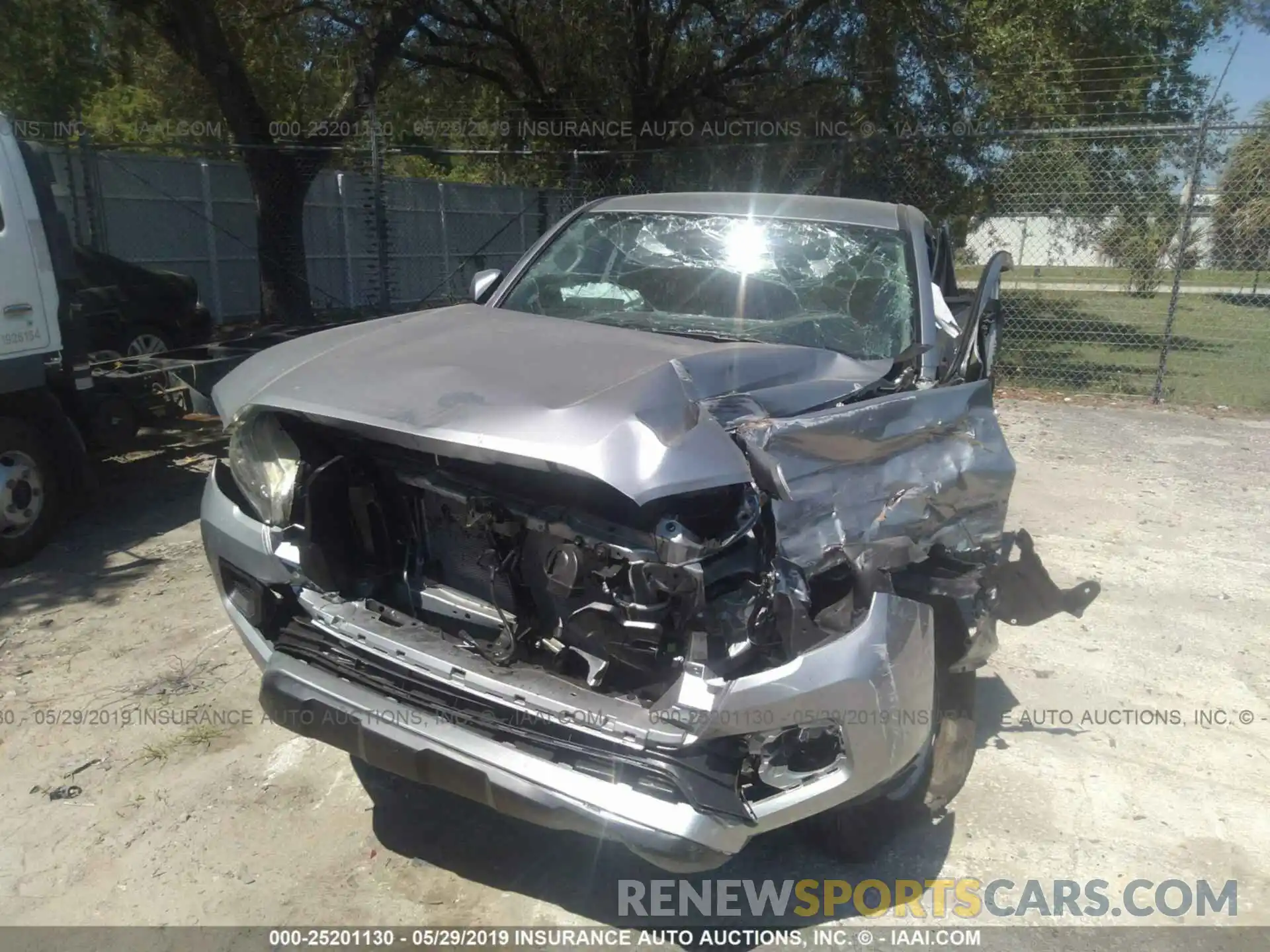 6 Photograph of a damaged car 5TFAX5GN0KX145533 TOYOTA TACOMA 2019