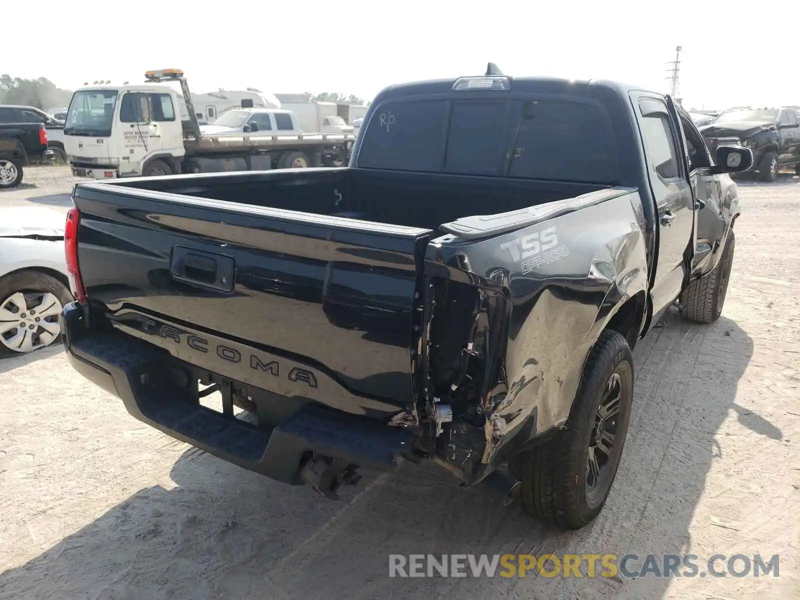 4 Photograph of a damaged car 5TFAX5GN0KX149758 TOYOTA TACOMA 2019