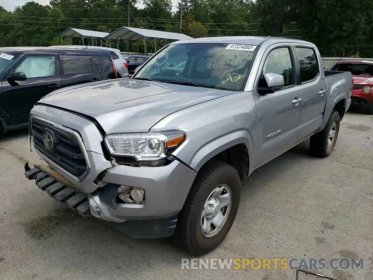 2 Photograph of a damaged car 5TFAX5GN0KX154619 TOYOTA TACOMA 2019