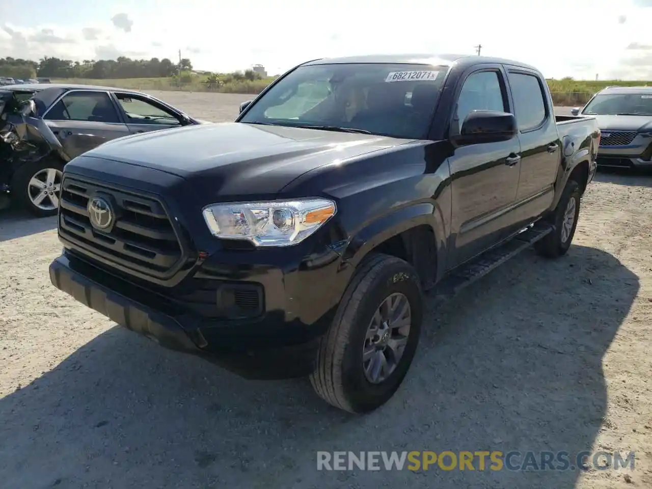 2 Photograph of a damaged car 5TFAX5GN0KX159156 TOYOTA TACOMA 2019