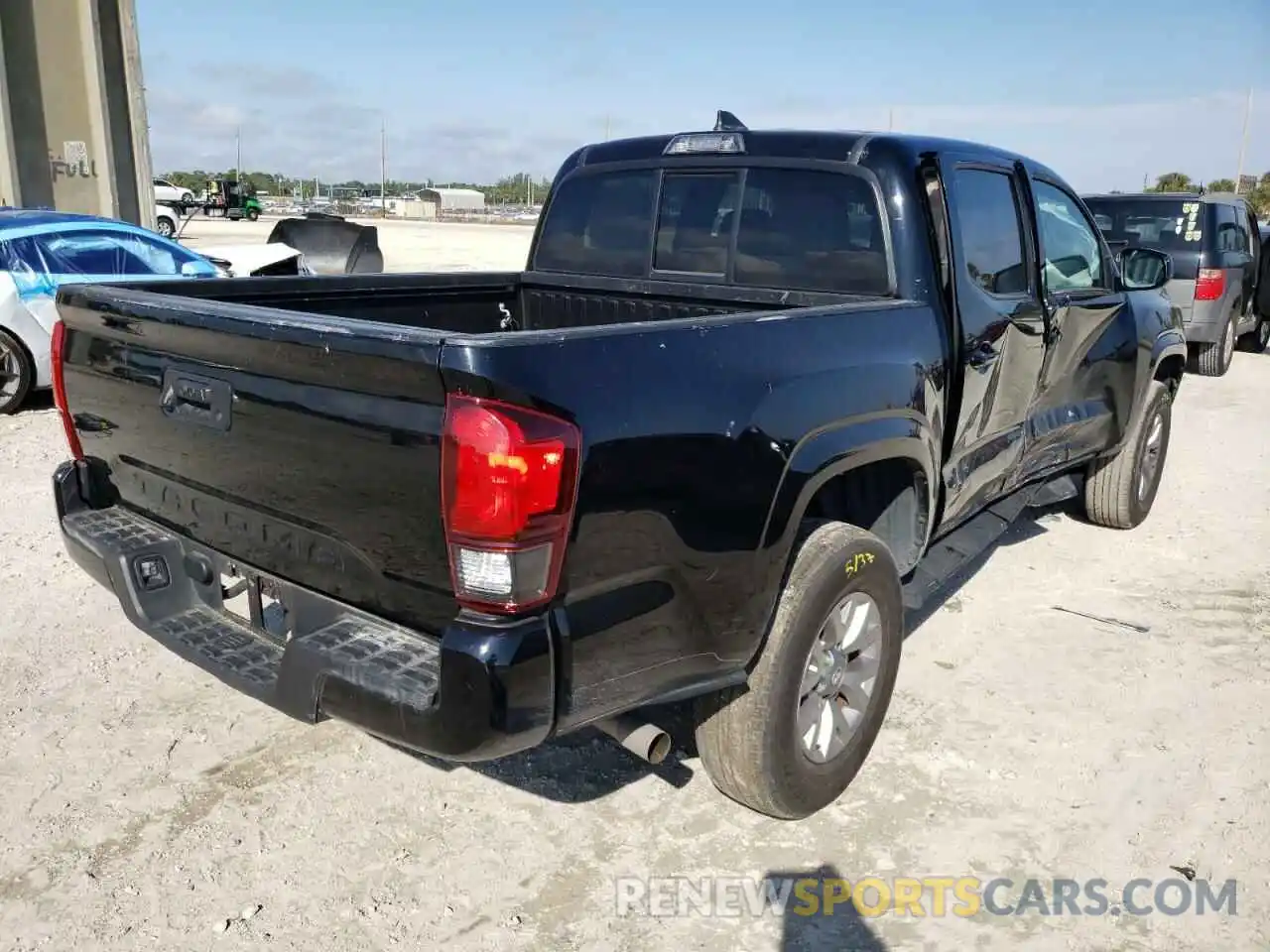 4 Photograph of a damaged car 5TFAX5GN0KX159156 TOYOTA TACOMA 2019