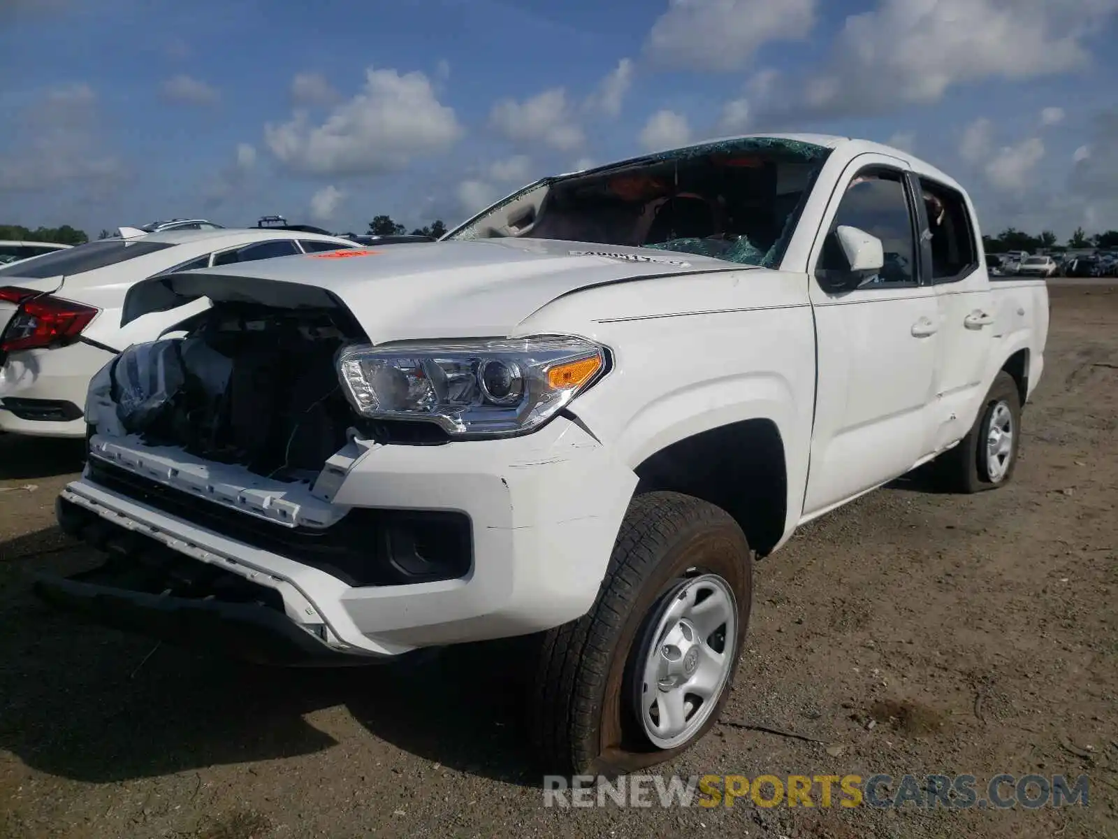 2 Photograph of a damaged car 5TFAX5GN0KX159822 TOYOTA TACOMA 2019