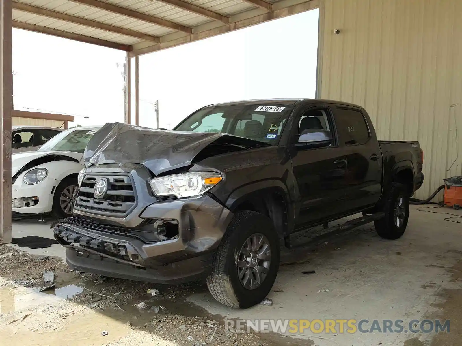 2 Photograph of a damaged car 5TFAX5GN1KX133892 TOYOTA TACOMA 2019