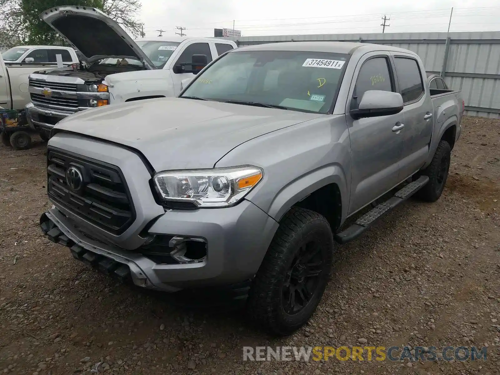 2 Photograph of a damaged car 5TFAX5GN1KX134847 TOYOTA TACOMA 2019