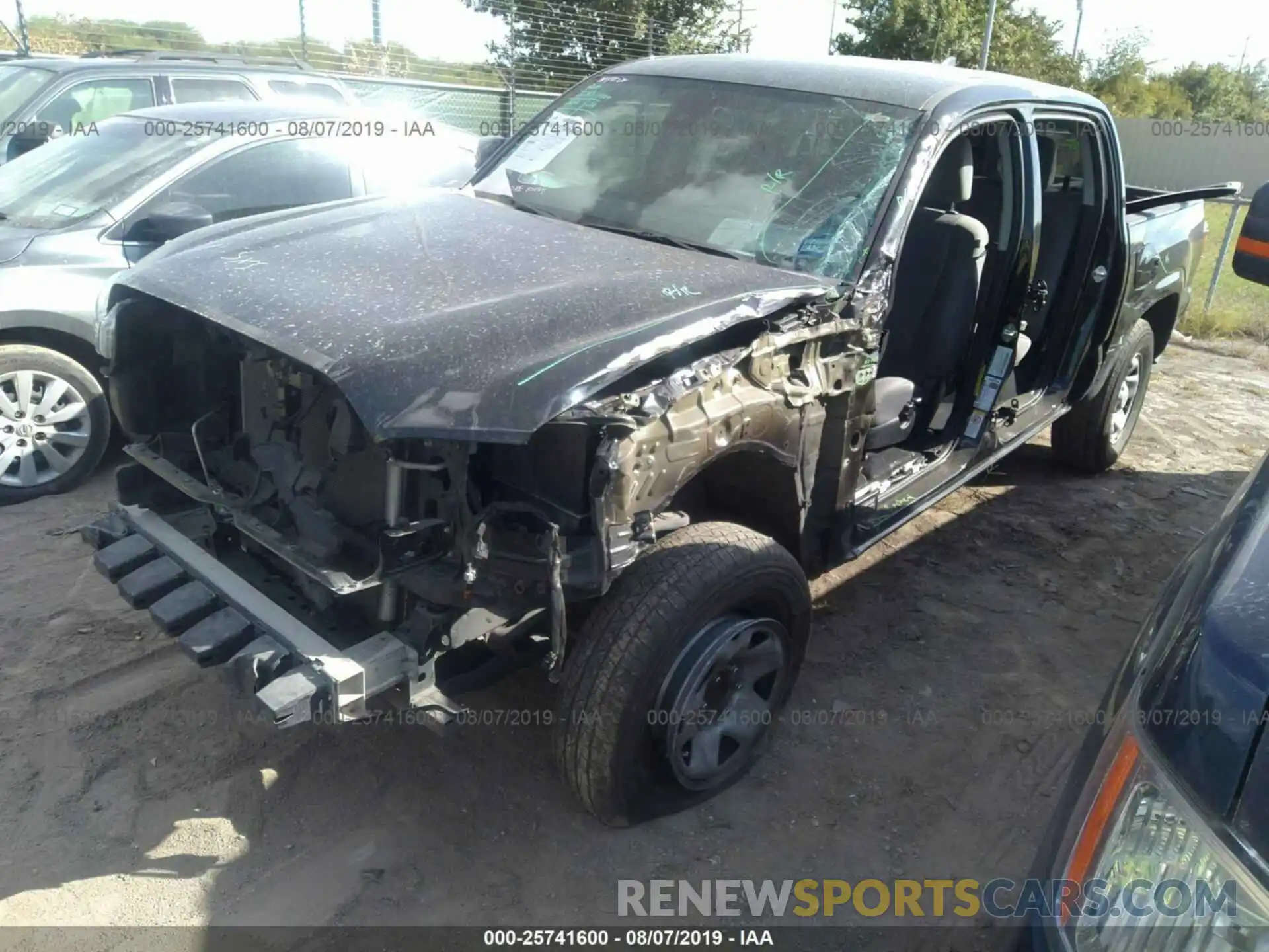 2 Photograph of a damaged car 5TFAX5GN1KX138669 TOYOTA TACOMA 2019