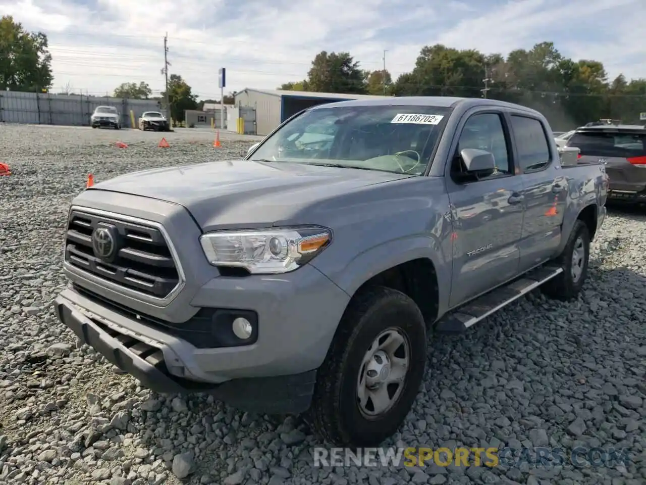 2 Photograph of a damaged car 5TFAX5GN1KX141250 TOYOTA TACOMA 2019