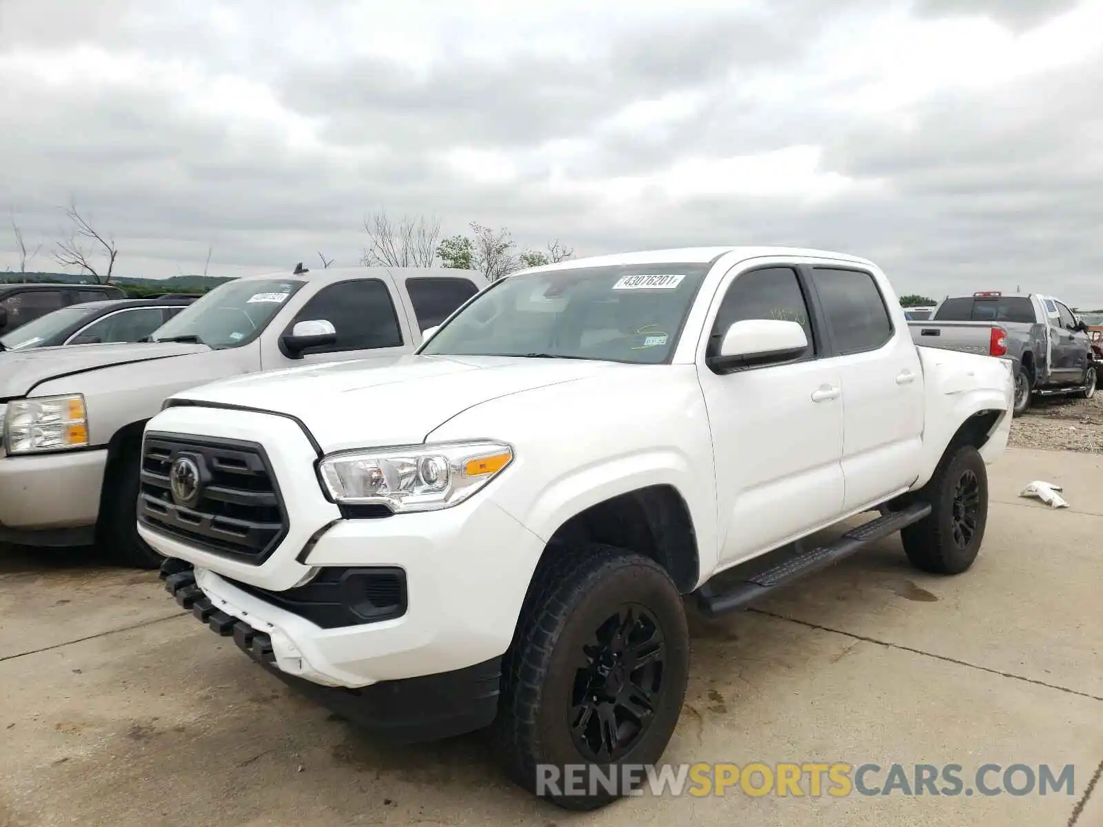 2 Photograph of a damaged car 5TFAX5GN1KX142088 TOYOTA TACOMA 2019