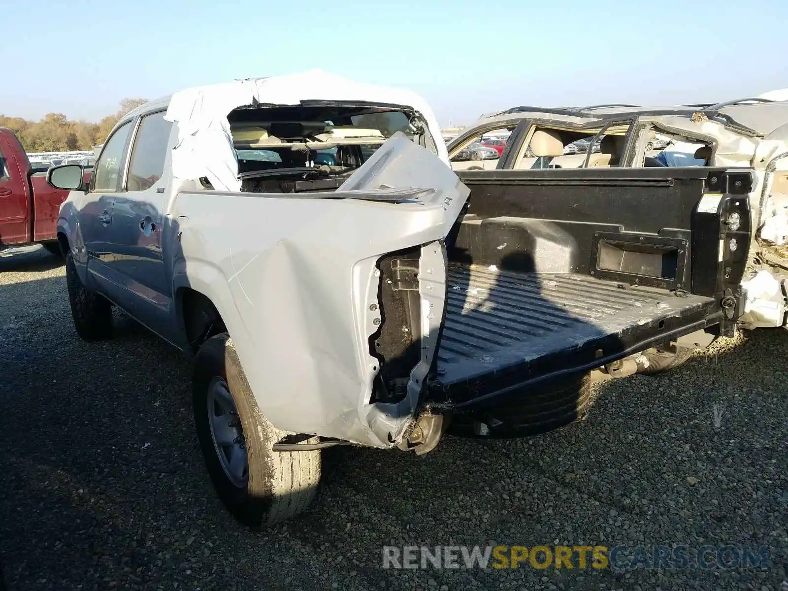 3 Photograph of a damaged car 5TFAX5GN1KX142222 TOYOTA TACOMA 2019