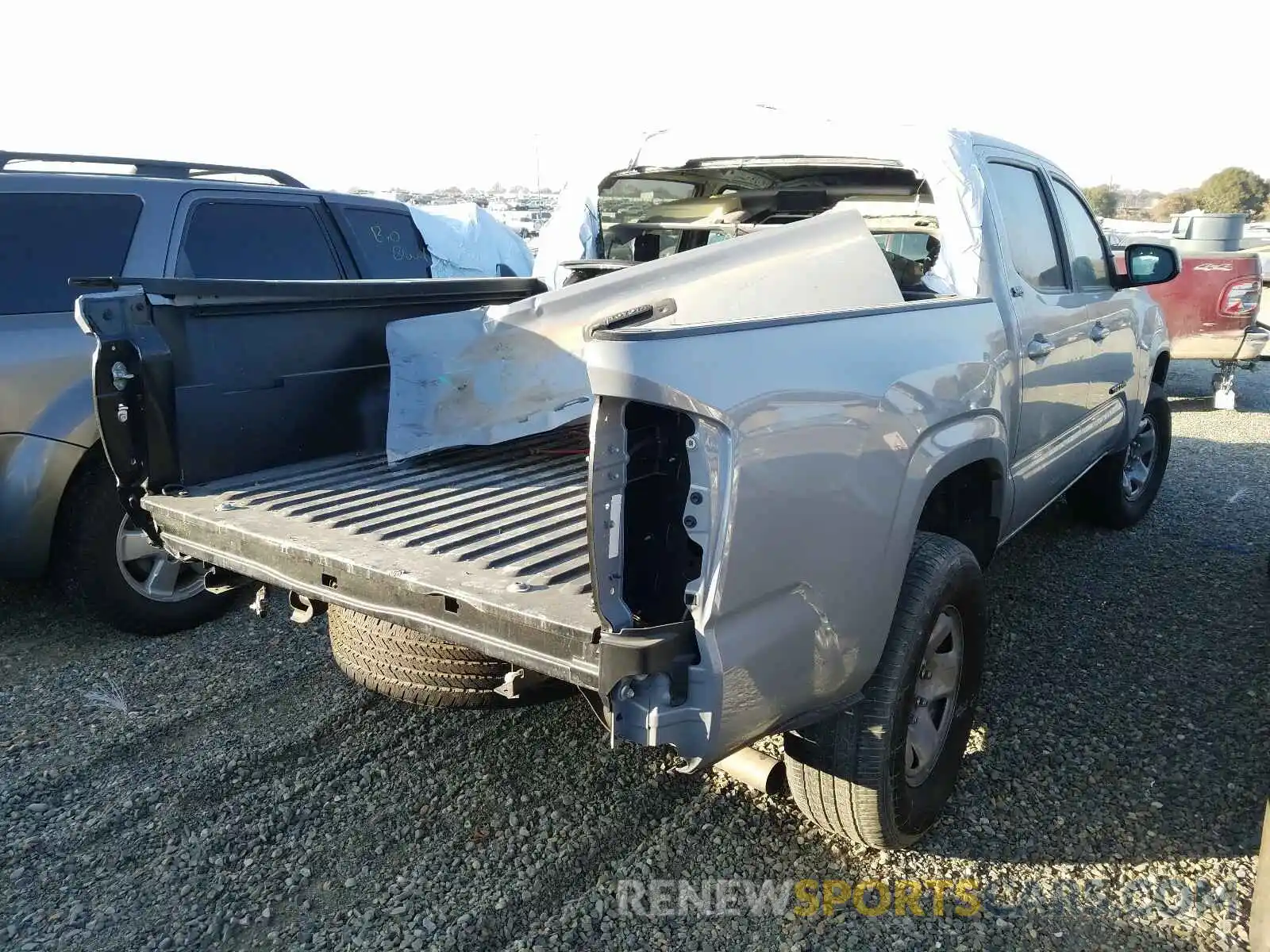 4 Photograph of a damaged car 5TFAX5GN1KX142222 TOYOTA TACOMA 2019