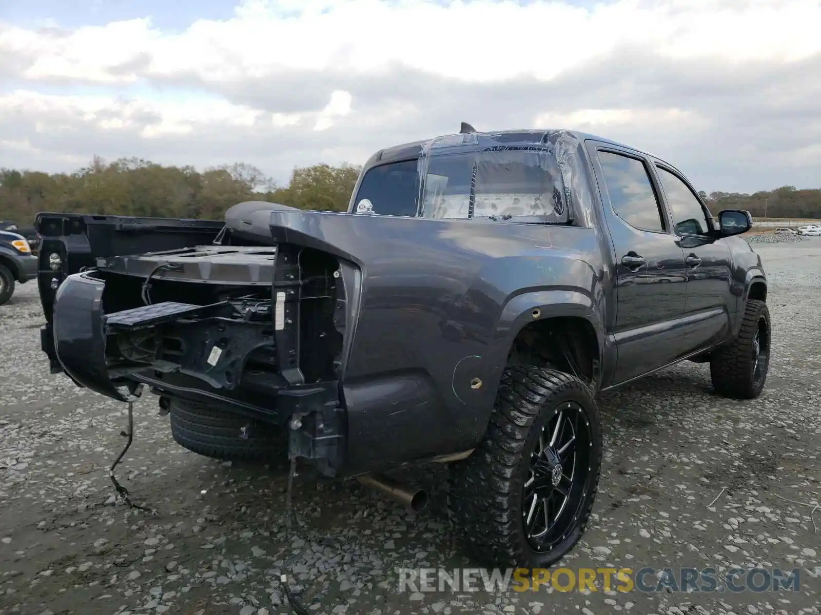 4 Photograph of a damaged car 5TFAX5GN1KX142706 TOYOTA TACOMA 2019