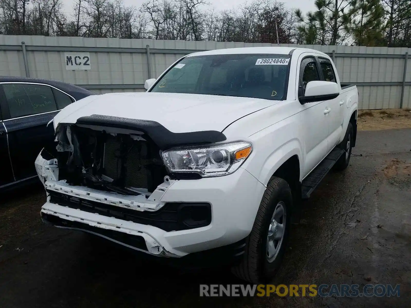 2 Photograph of a damaged car 5TFAX5GN1KX143323 TOYOTA TACOMA 2019