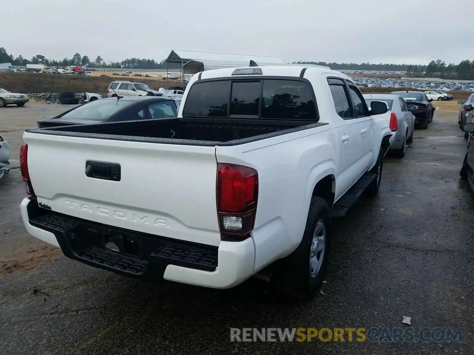 4 Photograph of a damaged car 5TFAX5GN1KX143323 TOYOTA TACOMA 2019