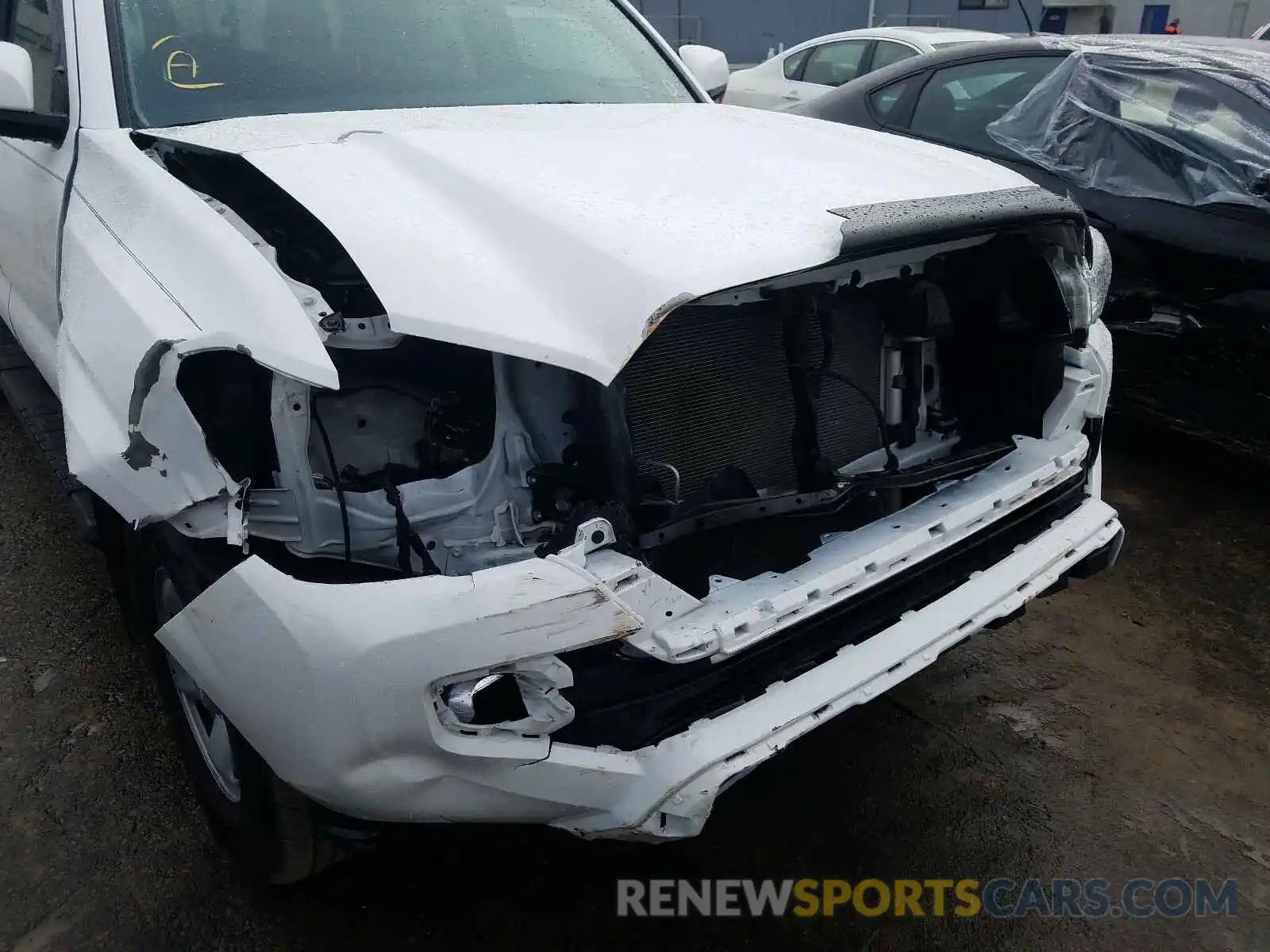 9 Photograph of a damaged car 5TFAX5GN1KX143323 TOYOTA TACOMA 2019