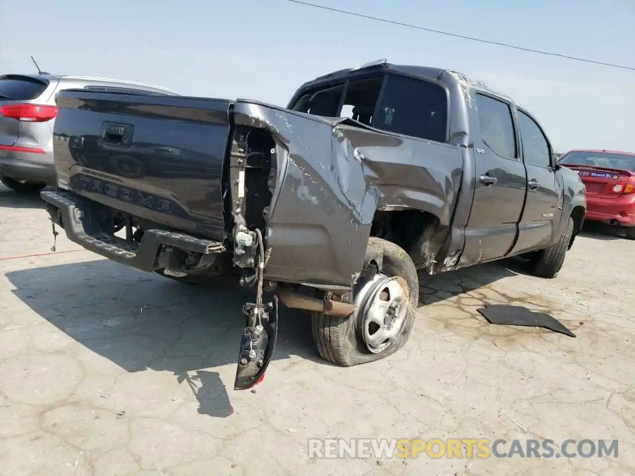 4 Photograph of a damaged car 5TFAX5GN1KX144195 TOYOTA TACOMA 2019