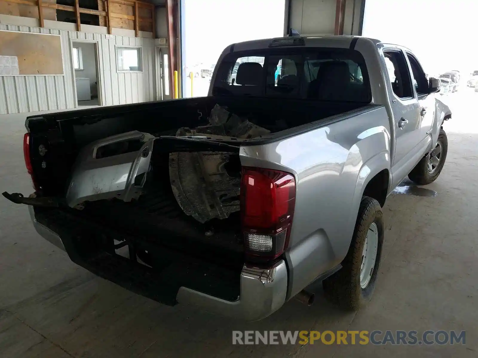 4 Photograph of a damaged car 5TFAX5GN1KX146139 TOYOTA TACOMA 2019