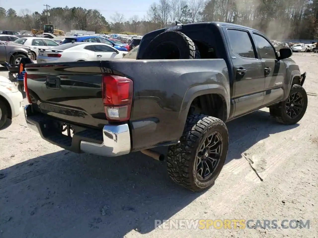 4 Photograph of a damaged car 5TFAX5GN1KX148375 TOYOTA TACOMA 2019