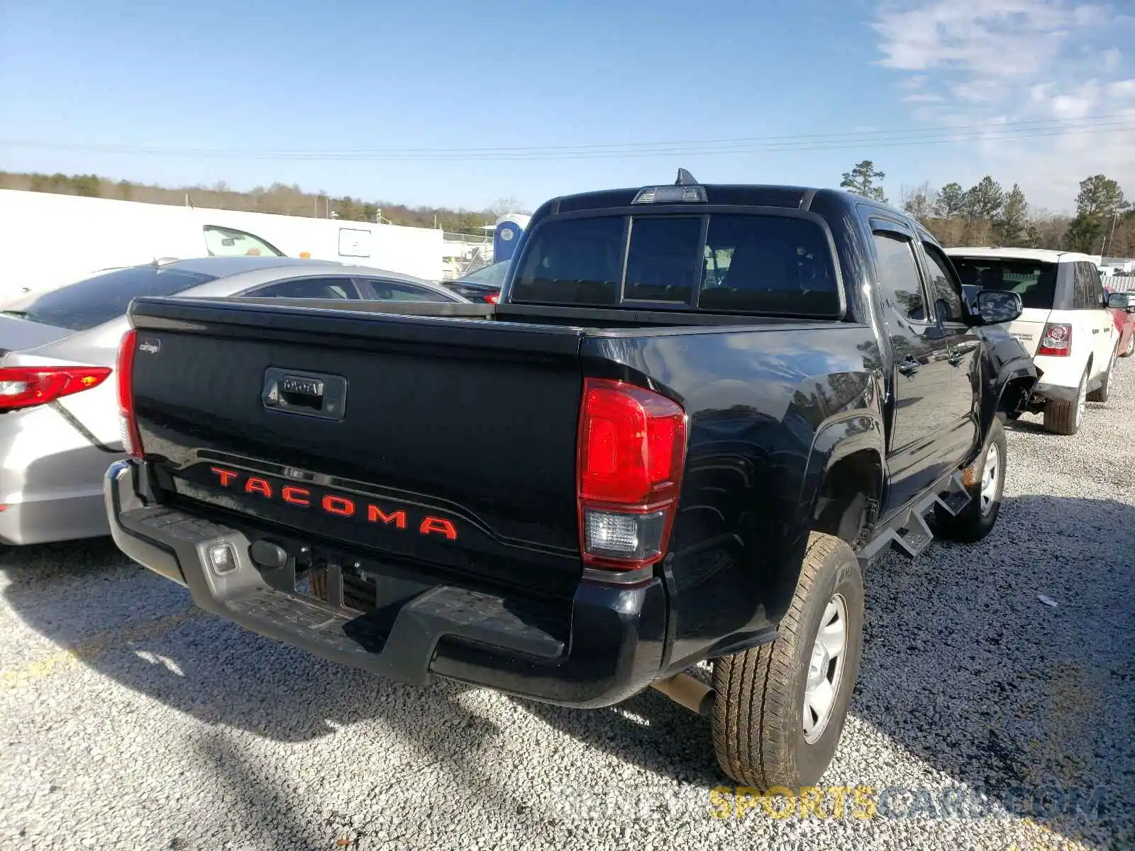 4 Photograph of a damaged car 5TFAX5GN1KX151762 TOYOTA TACOMA 2019