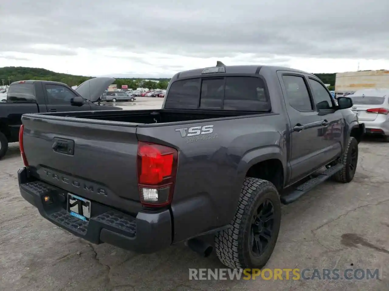 4 Photograph of a damaged car 5TFAX5GN1KX153222 TOYOTA TACOMA 2019