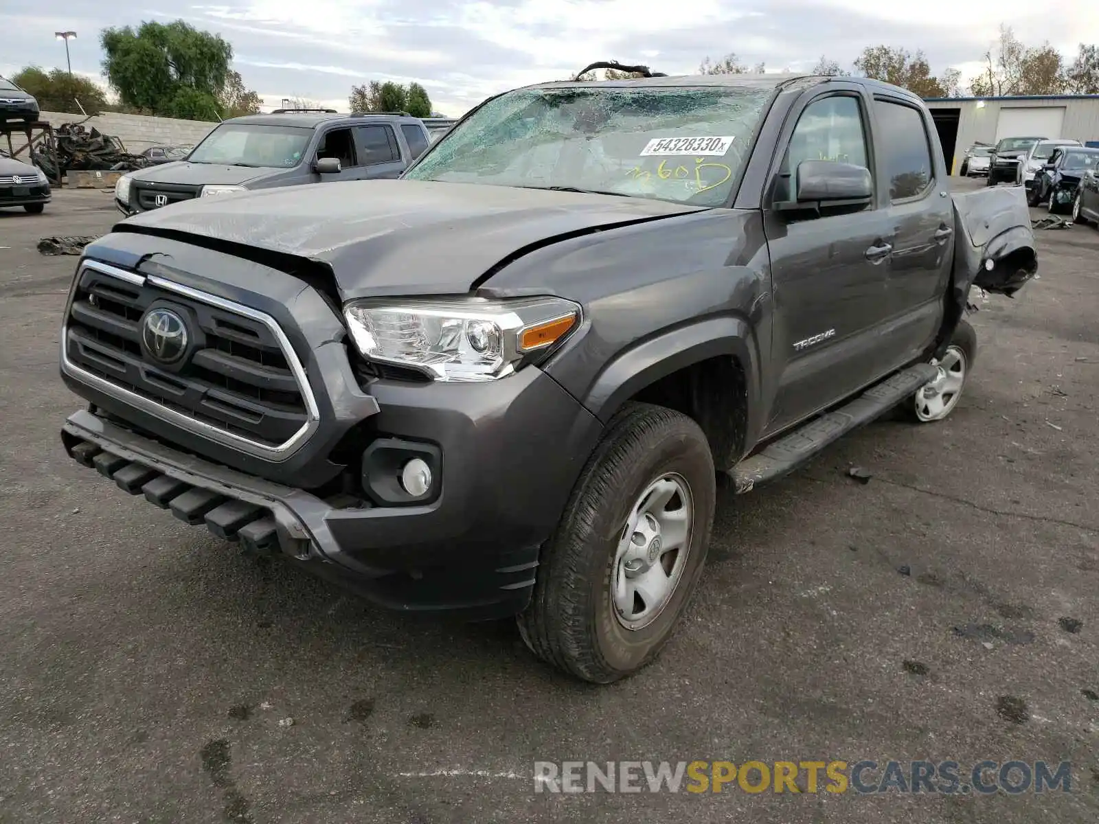 2 Photograph of a damaged car 5TFAX5GN1KX158646 TOYOTA TACOMA 2019