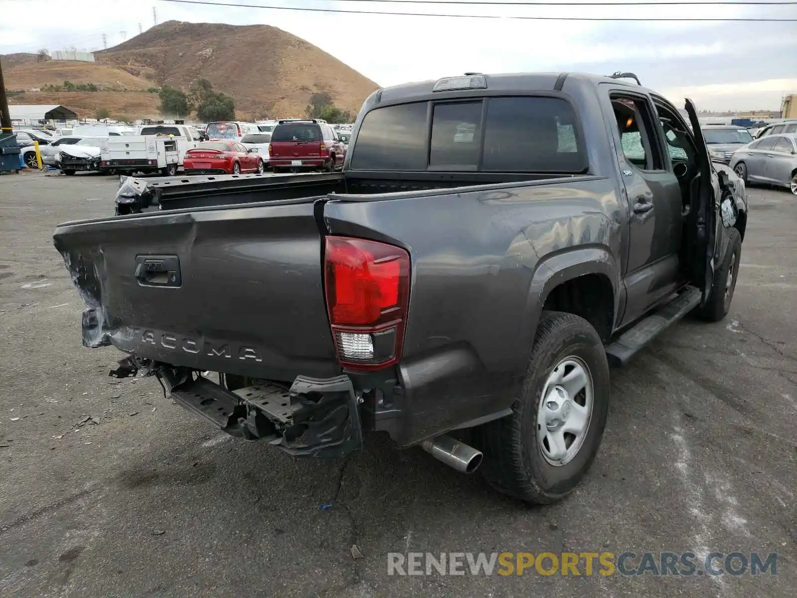 4 Photograph of a damaged car 5TFAX5GN1KX158646 TOYOTA TACOMA 2019