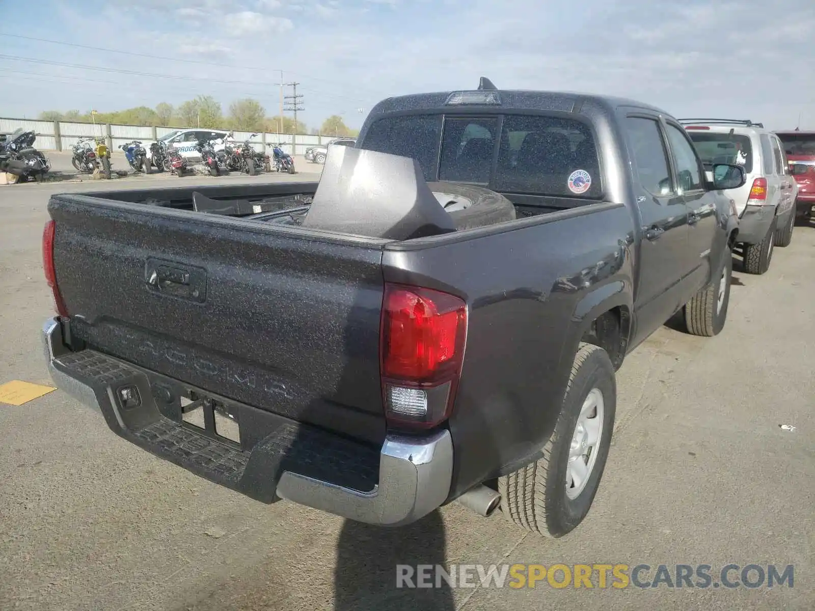 4 Photograph of a damaged car 5TFAX5GN1KX159263 TOYOTA TACOMA 2019