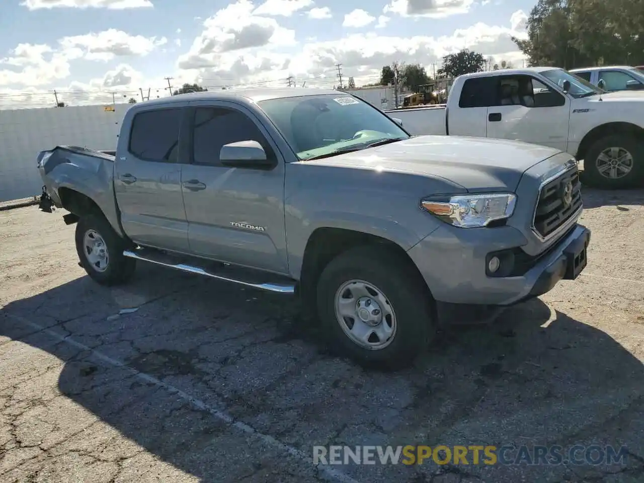 4 Photograph of a damaged car 5TFAX5GN1KX164172 TOYOTA TACOMA 2019